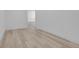 Bright bedroom featuring light wood flooring, fresh white walls, and modern recessed lighting at 300 S Franklin St, Denver, CO 80209