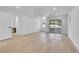A bright bedroom offers ample natural light and sliding door access to a balcony at 300 S Franklin St, Denver, CO 80209