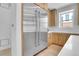 Spacious kitchen with stainless steel refrigerator and light wood cabinets at 300 S Franklin St, Denver, CO 80209