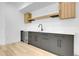 Stylish kitchenette with modern cabinets and countertops at 300 S Franklin St, Denver, CO 80209