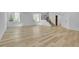 Large living space with hardwood floors and a staircase at 300 S Franklin St, Denver, CO 80209