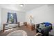 Bright, serene room with a scenic view, plush seating, and a cozy rug, creating a tranquil space at 8453 S Scenic Dr, Morrison, CO 80465