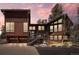 Stunning two-story home with wood siding, two-car garage, and picturesque front entrance at 8453 S Scenic Dr, Morrison, CO 80465