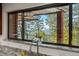 Kitchen window with sink offers spectacular mountain views at 8453 S Scenic Dr, Morrison, CO 80465