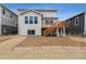 Home's exterior with a lovely deck, ample windows, and a spacious backyard ready for landscaping at 24788 E 40Th Ave, Aurora, CO 80019