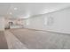 Finished basement with carpet, recessed lighting, and a wet bar at 24788 E 40Th Ave, Aurora, CO 80019