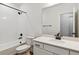 Clean bathroom with a shower-tub combo, and a white quartz counter at 24788 E 40Th Ave, Aurora, CO 80019