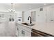 Bright, modern kitchen with stainless steel appliances, quartz counters, and hardwood flooring at 24788 E 40Th Ave, Aurora, CO 80019