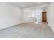Spacious loft area with neutral carpeting and an open view of the home's layout at 24788 E 40Th Ave, Aurora, CO 80019