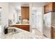 Bright kitchen with granite counters, stainless appliances, and lots of storage at 2161 Willow Ct, Denver, CO 80238