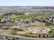 Wide aerial shot showcasing the community park with many neighborhood amenities at 2463 Tavern Way, Castle Rock, CO 80104
