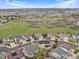 Aerial view of the neighborhood with a community view and lush green spaces at 2463 Tavern Way, Castle Rock, CO 80104
