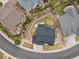 Stunning aerial view showcases the property's layout and meticulously landscaped backyard at 2463 Tavern Way, Castle Rock, CO 80104