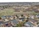 High definition aerial of the neighborhood reveals well-maintained homes and picturesque surroundings at 2463 Tavern Way, Castle Rock, CO 80104