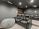 Home theater with reclining leather seating, wall decor and ambient lighting at 2463 Tavern Way, Castle Rock, CO 80104