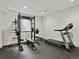 Fully equipped workout room features Rogue power rack and NordicTrack treadmill at 2463 Tavern Way, Castle Rock, CO 80104