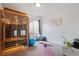 Exercise room with a personal sauna, fitness equipment, and natural light from a large window at 8112 Gray Ct # 394, Arvada, CO 80003