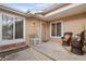 Inviting front porch with cozy seating, plants, and a friendly sign, perfect for relaxing outdoors at 8112 Gray Ct # 394, Arvada, CO 80003