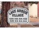 Lake Arbor Village sign, displaying building numbers and community information at 8112 Gray Ct # 394, Arvada, CO 80003