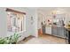 Eating area with connecting view of kitchen, cabinets, and appliances at 8112 Gray Ct # 394, Arvada, CO 80003