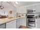 Well-maintained kitchen with stainless steel appliances, bright countertops, and ample storage at 8112 Gray Ct # 394, Arvada, CO 80003