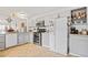 Bright kitchen features modern cabinets, stainless steel appliances and eat-in breakfast area at 8112 Gray Ct # 394, Arvada, CO 80003