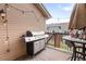 Outdoor patio with a barbecue grill perfect for entertaining at 8112 Gray Ct # 394, Arvada, CO 80003