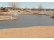 Picturesque pond view with a fountain and walking paths for serene enjoyment at 8112 Gray Ct # 394, Arvada, CO 80003