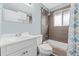 Modern bathroom showcasing updated tile and fixtures, along with a shower and tub at 9231 Irving St, Westminster, CO 80031