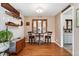 Cozy dining area features hardwood floors, natural light, and stylish furniture for comfortable meals at 9231 Irving St, Westminster, CO 80031