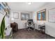 Dedicated home office space bathed in natural light from dual windows, carpet flooring at 9231 Irving St, Westminster, CO 80031