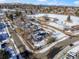 Aerial view of house and surrounding neighborhood at 1557 S Pierson St, Lakewood, CO 80232