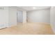 Finished basement with neutral walls and tiled floor at 1557 S Pierson St, Lakewood, CO 80232