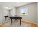 Home office in bedroom with mirrored closet and desk at 1557 S Pierson St, Lakewood, CO 80232