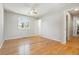 Bright bedroom with hardwood floors and window views at 1557 S Pierson St, Lakewood, CO 80232