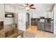 Updated kitchen with granite countertops and two-toned cabinetry at 1557 S Pierson St, Lakewood, CO 80232
