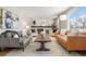 Spacious living room with a fireplace and stylish furniture at 1557 S Pierson St, Lakewood, CO 80232