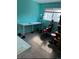 Home office space with a sleek, modern desk setup and comfortable gaming chair at 2285 S Jasper Way # A, Aurora, CO 80013