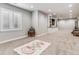 Open basement area with entertainment center, natural light, and play area at 5411 Edenborn Way, Castle Rock, CO 80104