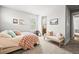 Comfortable bedroom with a cozy bed, bench, and decorative pillows at 5411 Edenborn Way, Castle Rock, CO 80104