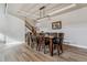 Elegant dining room with a stylish light fixture and ample seating for Gathering gatherings at 5411 Edenborn Way, Castle Rock, CO 80104
