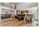 Open-concept living room showcases soaring ceilings, a grand view, and stylish décor at 5411 Edenborn Way, Castle Rock, CO 80104
