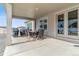 Covered patio area perfect for outdoor dining and relaxation at 5411 Edenborn Way, Castle Rock, CO 80104