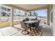 Covered patio complete with outdoor dining and backyard views, ideal for entertaining at 5411 Edenborn Way, Castle Rock, CO 80104
