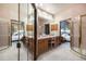 Spacious bathroom includes dual vanities, and shower room at 9873 Greensview Cir, Lone Tree, CO 80124