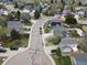 Neighborhood aerial showcasing the well-maintained lawns, mature trees, and quiet streets in a peaceful setting at 1521 Redtail Ct, Longmont, CO 80504