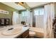 Full bathroom featuring shower-tub combo with tiled walls and shower curtain at 1521 Redtail Ct, Longmont, CO 80504