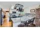 Spacious kitchen featuring stone countertops, stainless steel appliances, a window and breakfast bar at 1521 Redtail Ct, Longmont, CO 80504