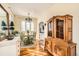 Charming dining room with hardwood floors and a round table at 6000 W 29Th Ave, Denver, CO 80214
