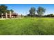 Expansive green park with a covered picnic area and baseball field in the background at 6000 W 29Th Ave, Denver, CO 80214
